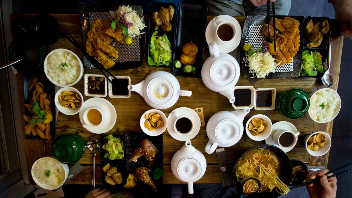 flat lay photo of katsu tea set and bowl of ramen